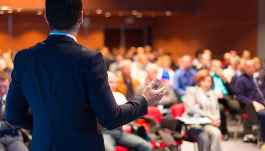 Speaker at a conference.