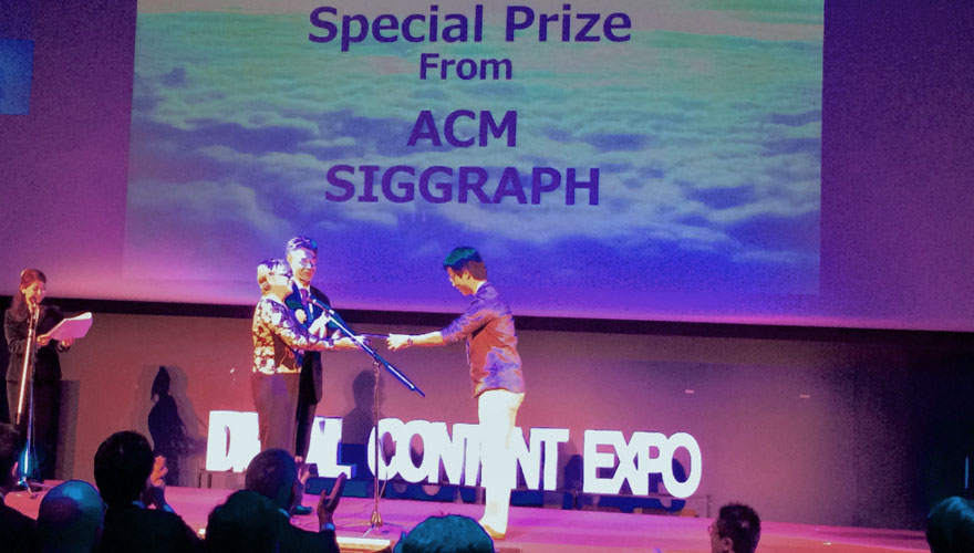 Jacki Morie presents the ACM SIGGRAPH Special Prize at DCAJ